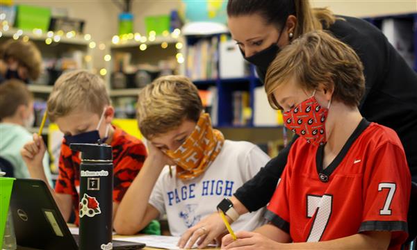 Students work on Escape Room problems